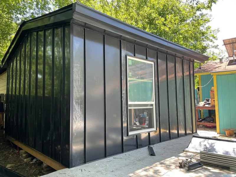 Black standing seam metal wall panels for Metal Roof Installation in Baytown