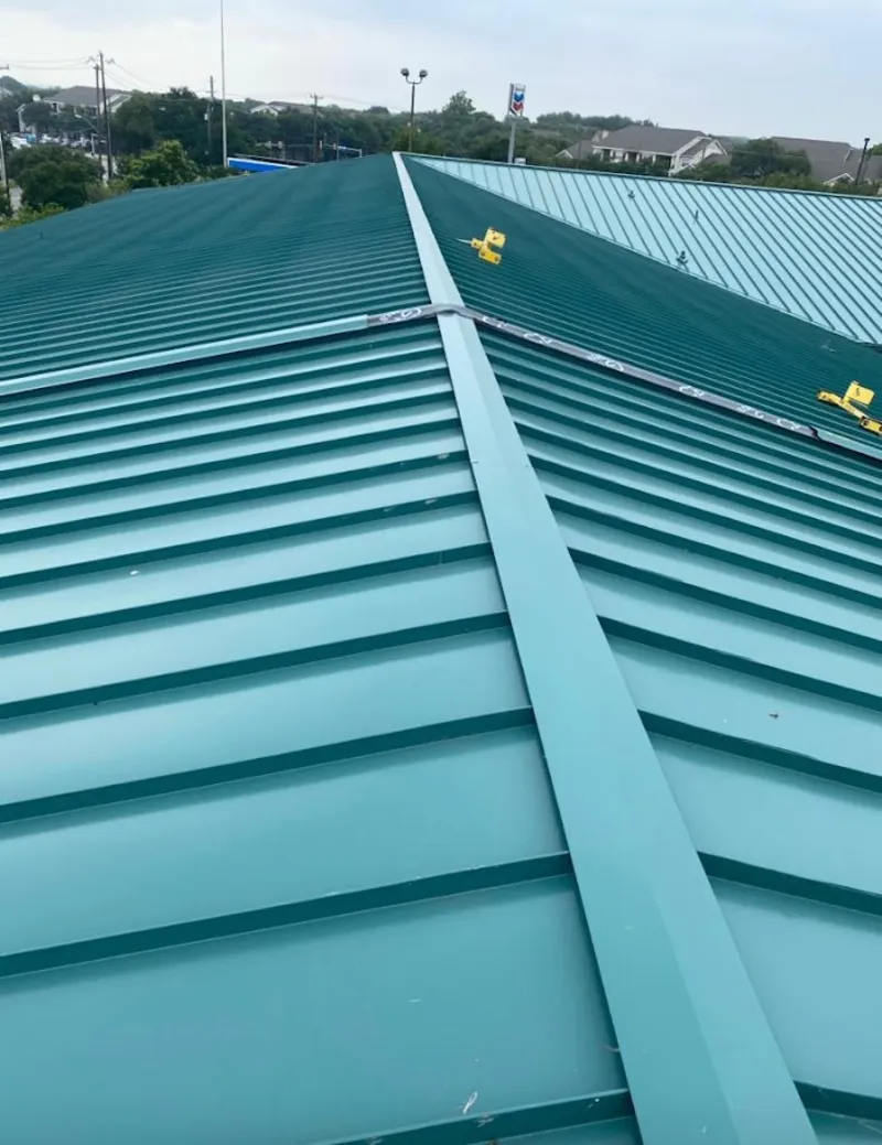 Green commercial metal roof ridge and valley for Metal Roof Repair in Baytown