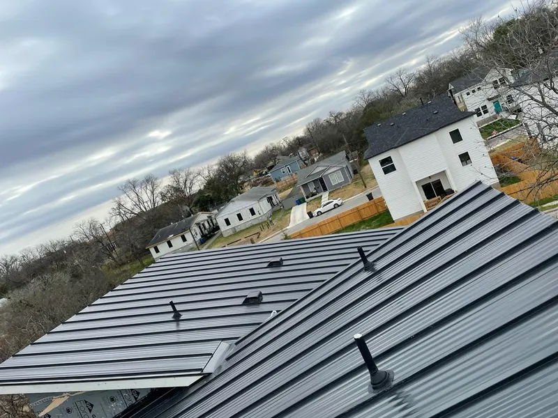 Standing seam metal roof panels with vents for Skylight Repair in Baytown